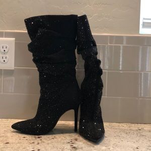Black Jessica Simpson boots used.